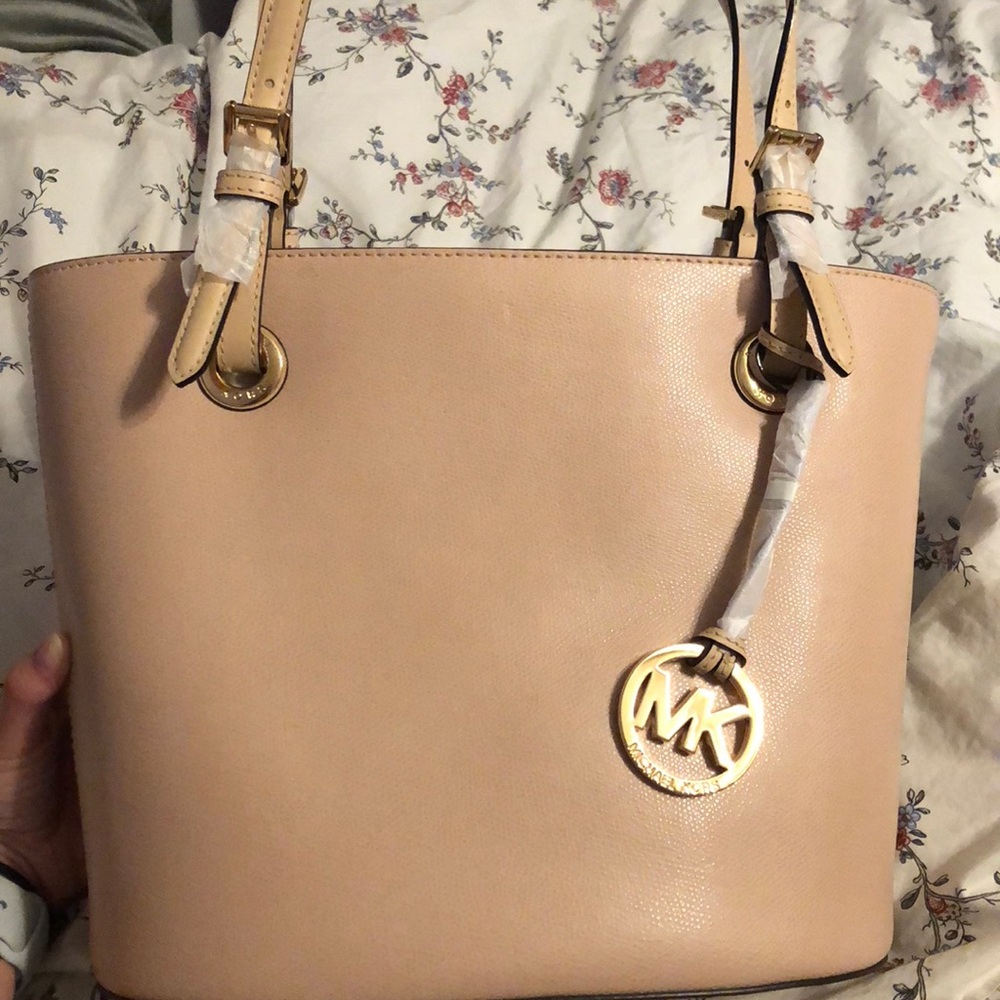 Blush colored Michael Kors handbag
